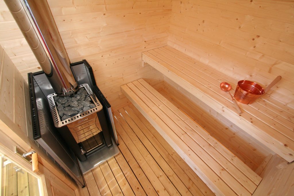 https://www.sauna.ca/wp-content/uploads/2019/10/Kuikka-Interior-Wood-Burnning-Heater.jpeg